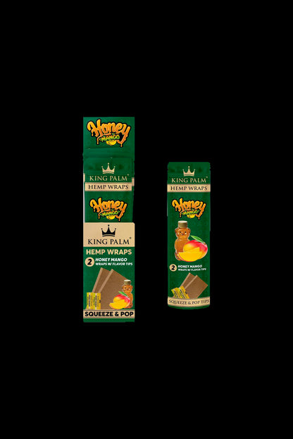 Two packages of King Palm Honey Mango hemp wraps with flavor tips, displayed against a black background.