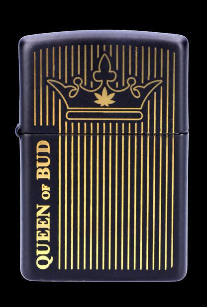 Black Zippo-style lighter with gold vertical lines and a cannabis leaf crown design, reading "Queen of Bud."