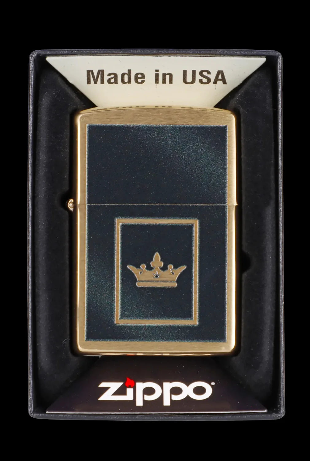Zippo lighter with a gold crown emblem, packaged in a black insert.