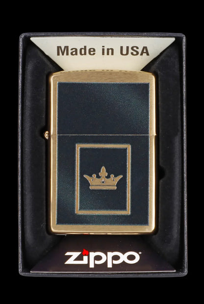 Zippo lighter with a gold crown emblem, packaged in a black insert.