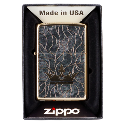 Zippo lighter with a black and gold cannabis leaf design in its packaging.
