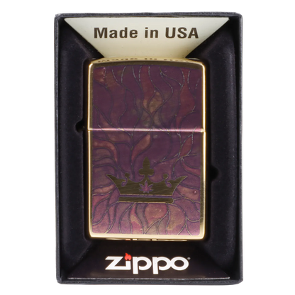 Zippo lighter with a purple and gold cannabis leaf design in its packaging.