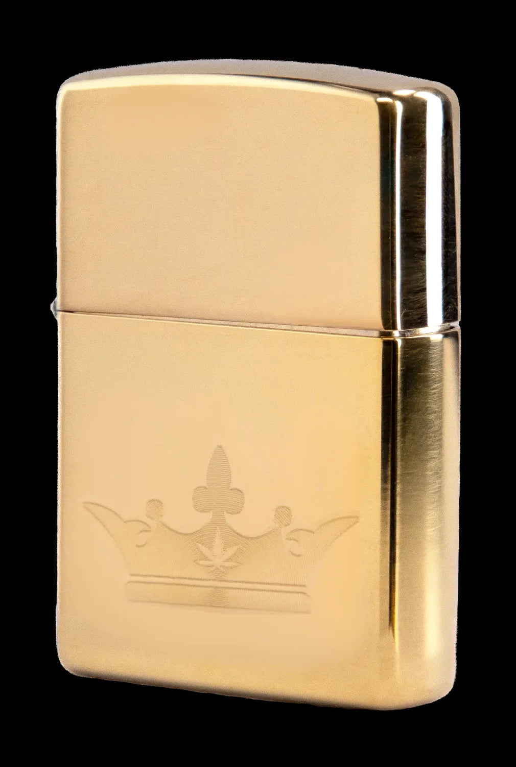 Gold Zippo lighter engraved with a cannabis leaf design.