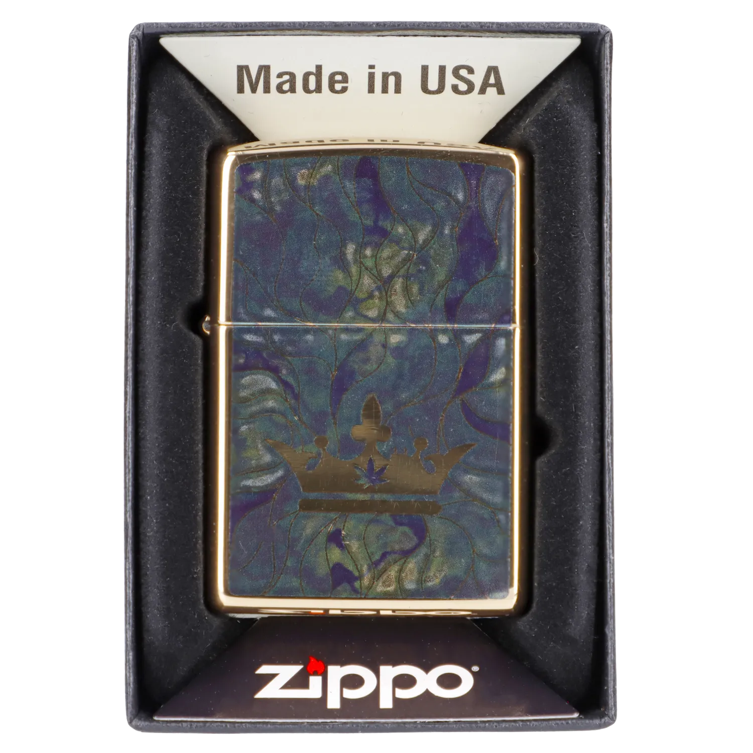 Zippo lighter with a cannabis leaf design in a display box.