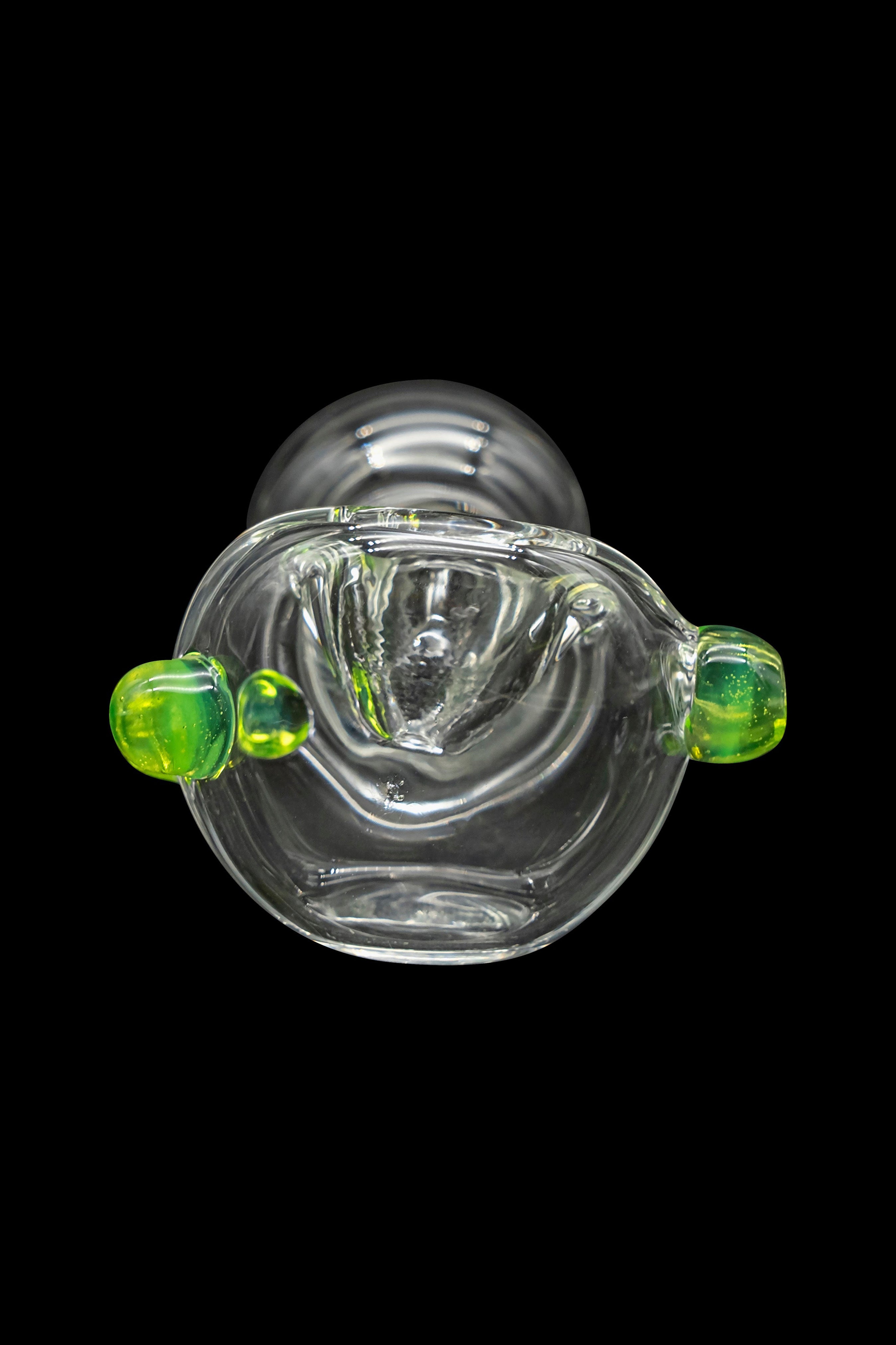 Clear glass cannabis bubbler with green accents, studio shot on black.
