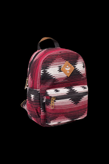 Red and black patterned backpack, likely designed for discreet cannabis accessory storage.