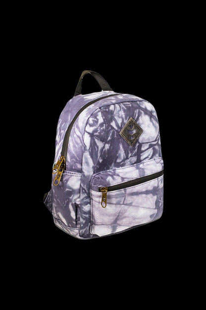 Tie-dye mini backpack with cannabis leaf patch, isolated on black.