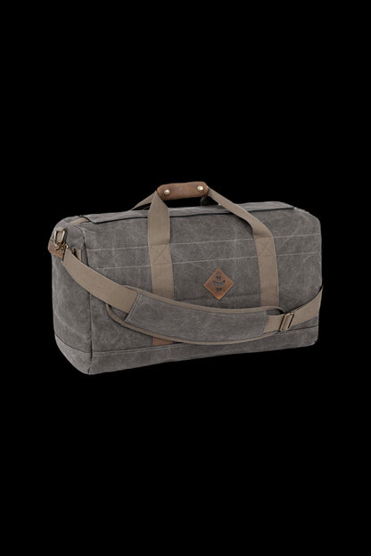 Dark green canvas duffel bag with leather accents, designed for discreet cannabis accessory storage.