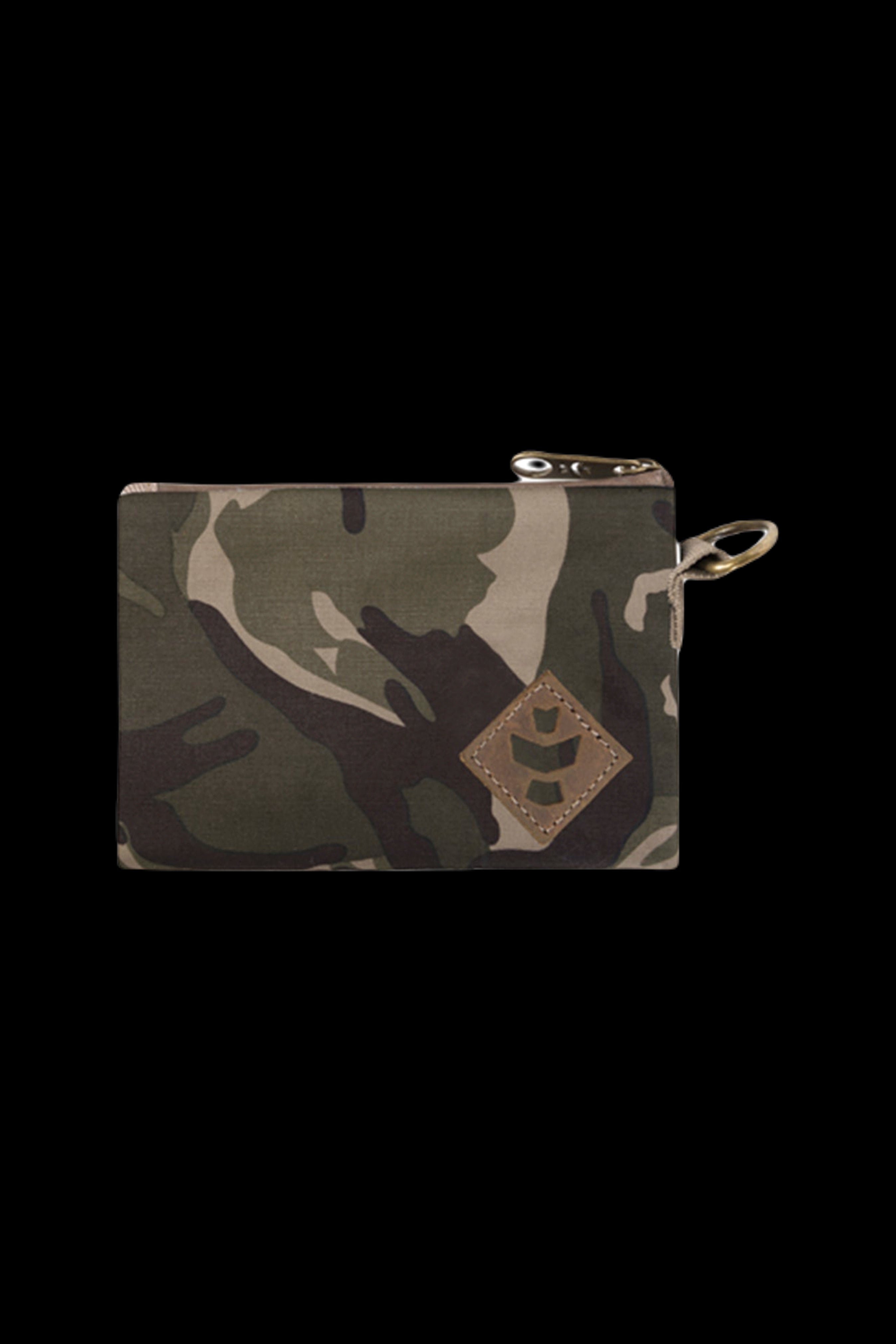 Close-up front view of the camo Revelry Supply Smell Proof Zippered Small Stash Bag - The Mini Broker showing the top zipper, keyring loop, and stitched leather patch.