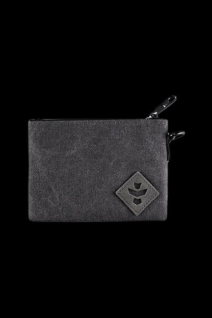 Close-up front view of the Revelry Supply Smell Proof Zippered Small Stash Bag - The Mini Broker in dark tie-dye fabric with a top zipper and stitched diamond logo.