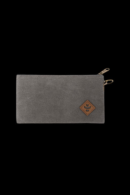 Dark gray zippered pouch with a brown leather patch featuring a diamond-shaped logo, likely for cannabis accessories.