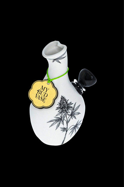 White ceramic cannabis-themed bud vase with a tag reading "My Bud Vase" and a black glass mouthpiece.