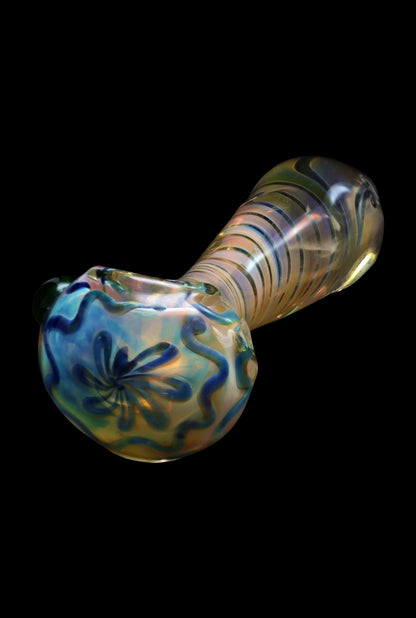 Hand-blown glass pipe with iridescent blue and gold floral details.