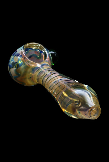 Hand pipe with colorful glass swirls.