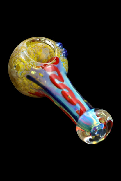Hand pipe with colorful glass swirls.