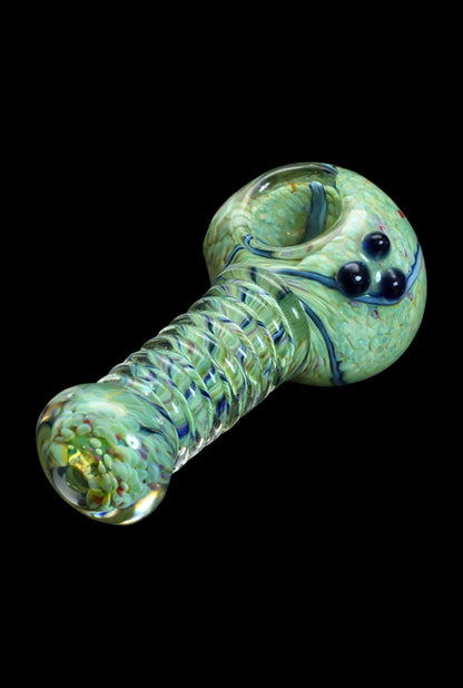 Green glass cannabis pipe with blue swirls and textured stem.