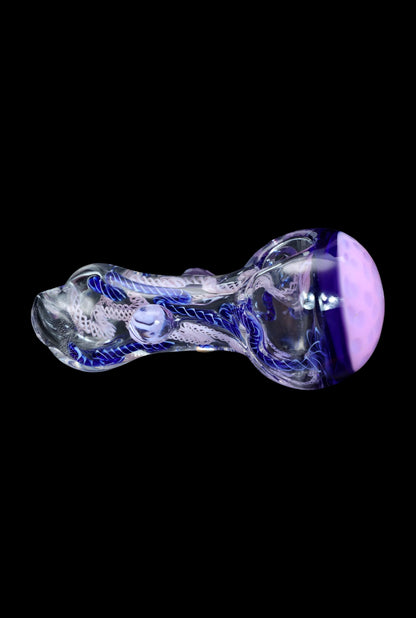 Hand-blown glass pipe with intricate blue and white floral patterns, featuring a lavender-colored mouthpiece.