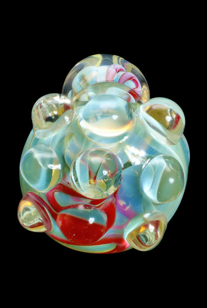 Hand-blown glass cannabis dab rig with colorful swirling patterns.