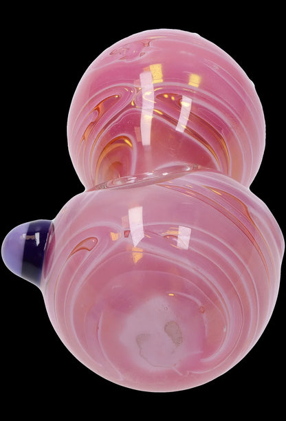 Pink glass bubbler with blue mouthpiece.