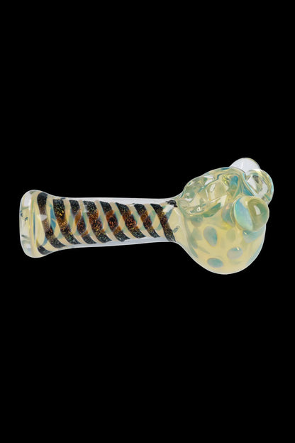 A side view of the 4.5-inch Dicro Spoon Pipe, showcasing its colorful dichroic glass finish.