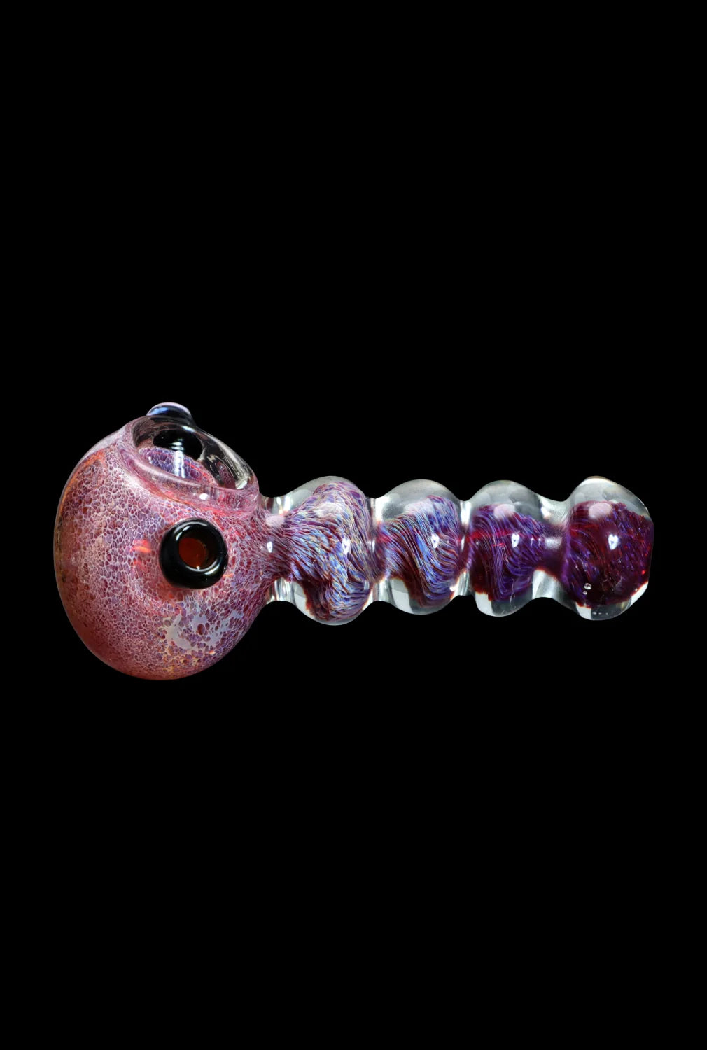 Colorful glass pipe with a speckled red bowl and purple, swirled stem, isolated on a black background.
