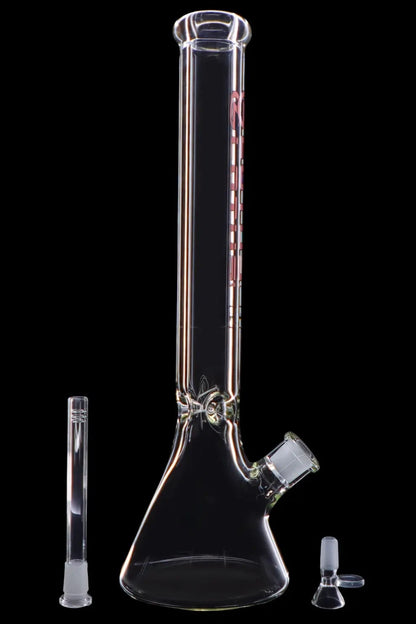 Clear glass bong with downstem and bowl, isolated on black.