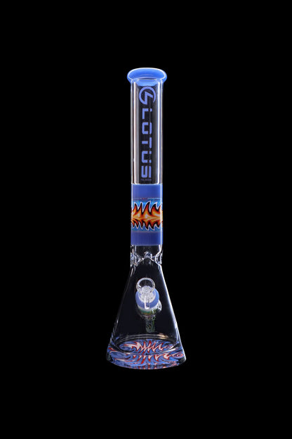 Blue and orange glass bong with flame design against a black background.