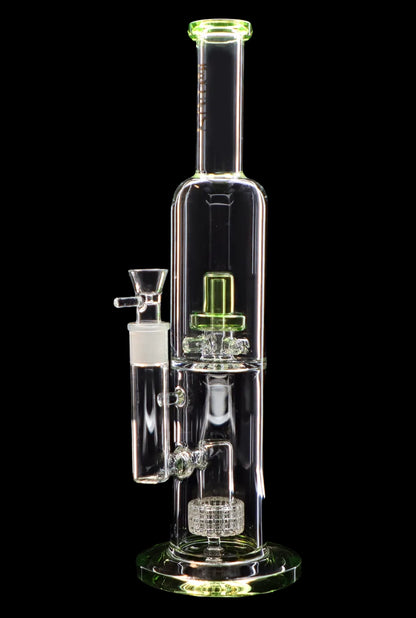 Clear glass water pipe (bong) with green accents, studio shot on black background.