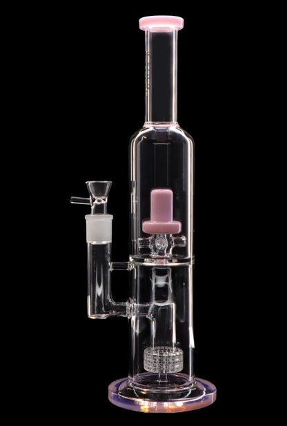 Clear glass water pipe (bong) with pink accents, featuring multiple chambers and filtration components, isolated on a black background.
