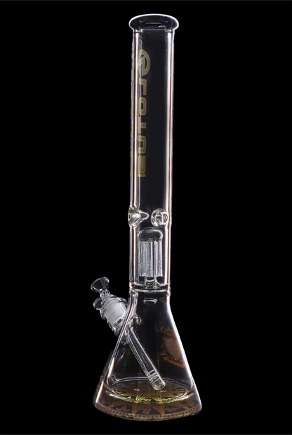 Tall glass bong with intricate percolator and clear liquid at the base, isolated on a black background.