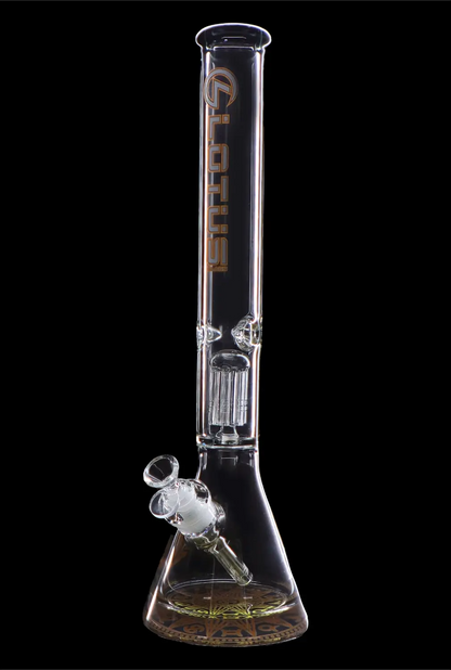 Glass water pipe (bong) with ice catcher and intricate design, isolated on black.