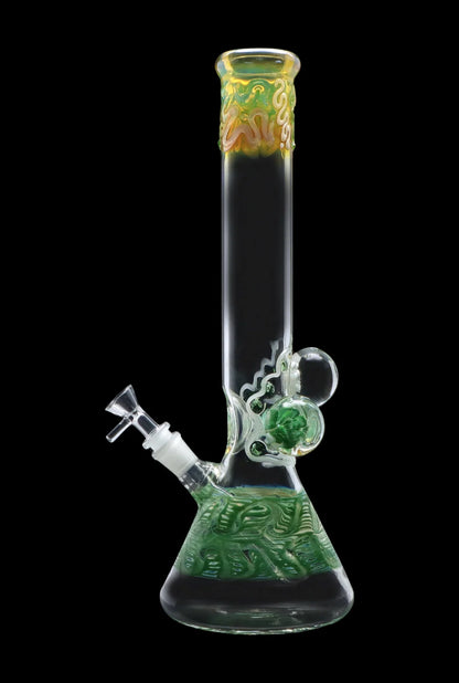 Centered front view of the Smoke Cartel Mushroom Marble Water Pipe - 18 in., showing a clear straight tube with green marbled base and yellow-accented mouthpiece.