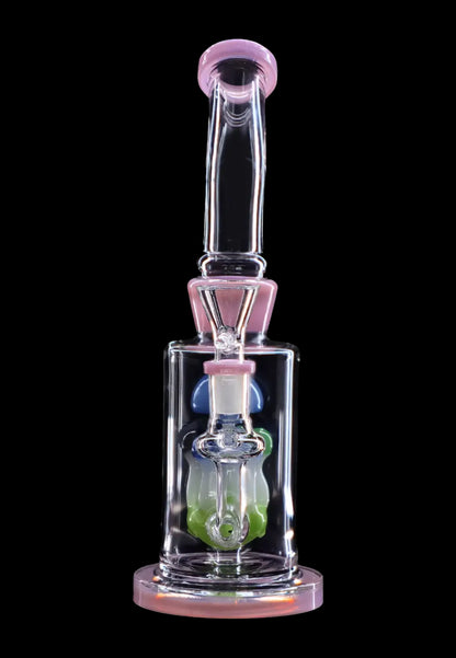 A colorful glass water pipe (bong) with a bubbler design, isolated on a black background.