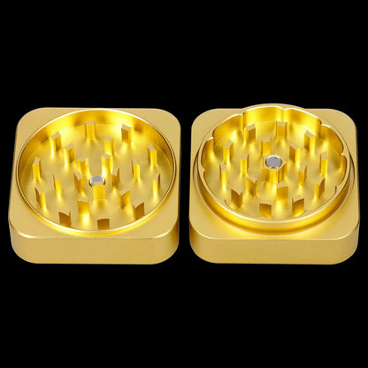 Gold cannabis grinders with visible teeth, displayed side-by-side on a black background.