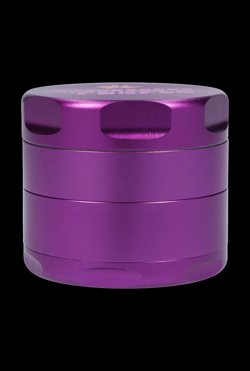 Purple four-piece metal grinder for cannabis.