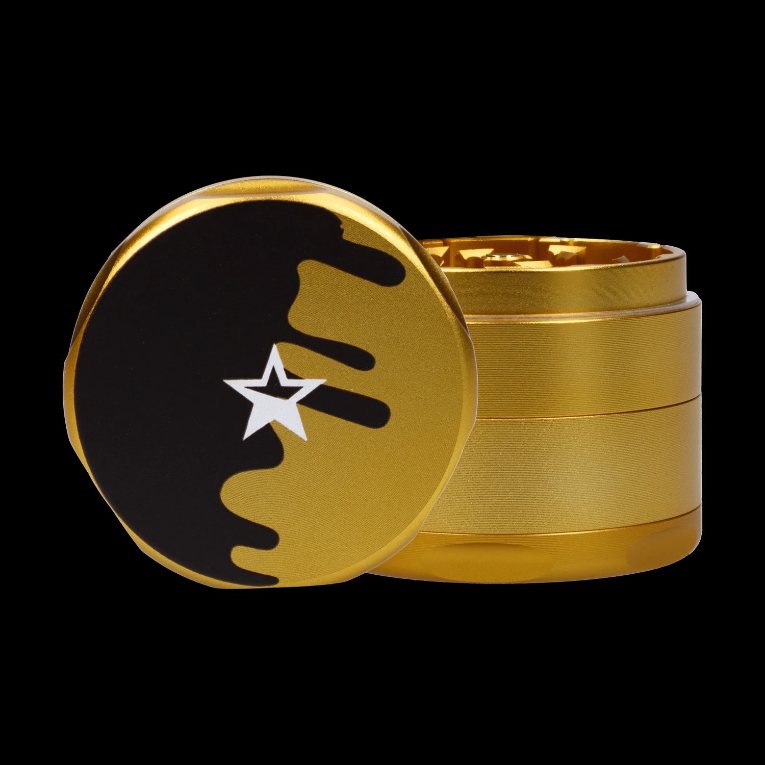Close-up front view of the Famous Design-Surrender Aluminum 3 Stage Grinder-Gold showing its gold stacked body and black-top with a white star emblem.