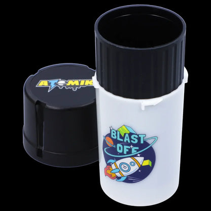 Cannabis oil cartridge container with a rocketship design and "Blast Off" branding.