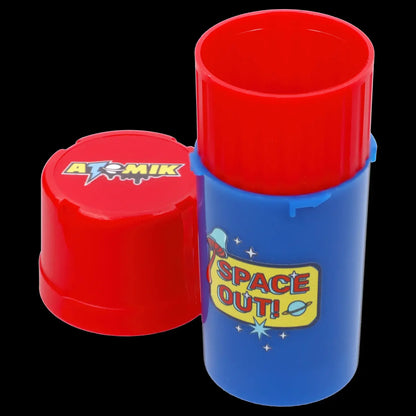 Colorful, cylindrical cannabis storage container with “Atomik” and “Space Out!” branding.