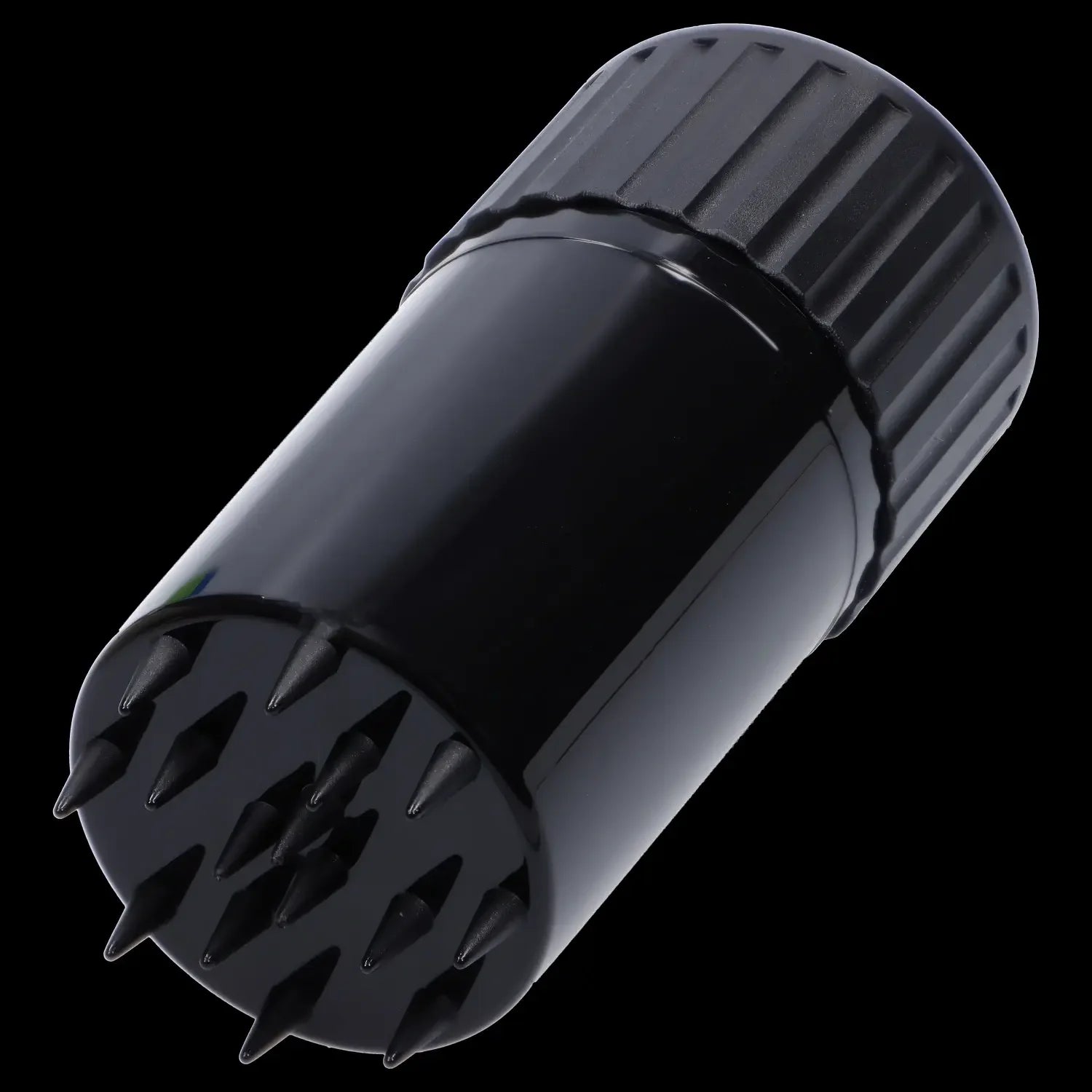 Black silicone cannabis concentrate container with textured grip.