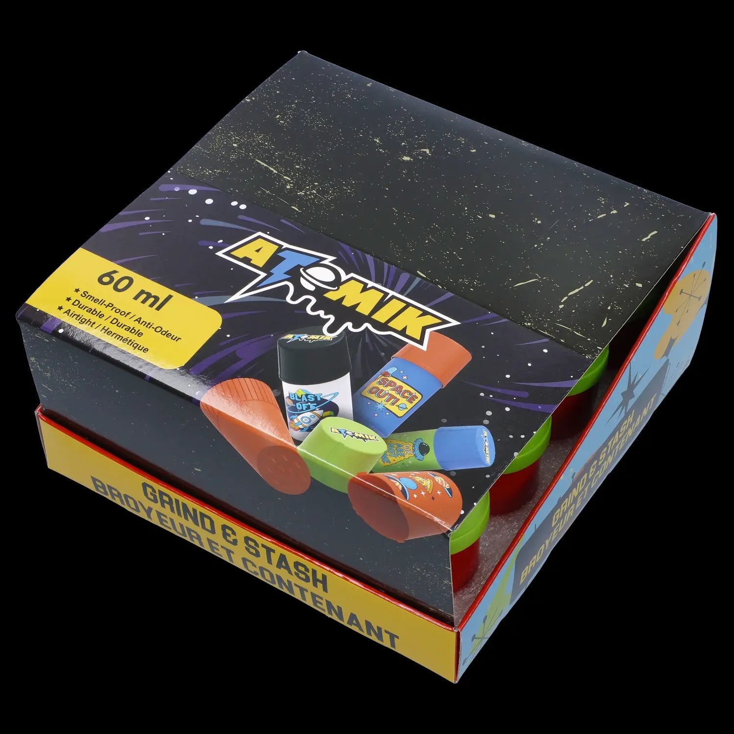 A colorful, patterned box labeled “Atomik” and “Grind & Stash” containing various small, brightly colored containers and a grinder, likely for cannabis storage and preparation.