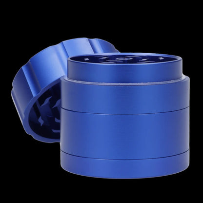 Blue four-piece cannabis grinder with open lid.