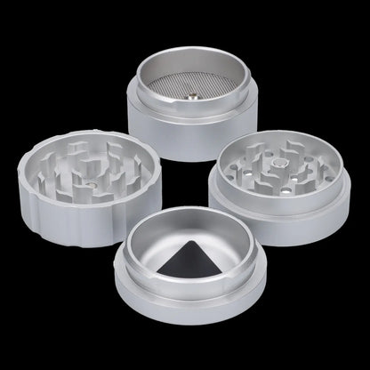 Silver cannabis grinder components disassembled and arranged in a circular pattern on a black background.