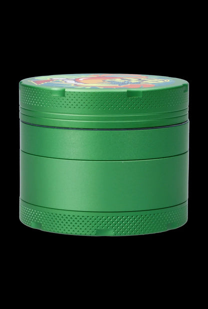 Close-up front view of a green Cabana Cannabis Co. 3-Stage Grinder Parasol Green on a black background.