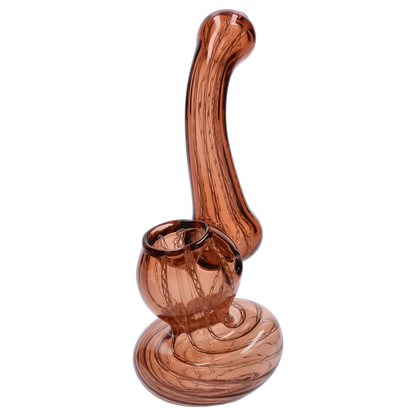 Angled close-up of the amber glass Smoke Cartel Mini Bubbler with Colored Tube showing its rounded base, curved neck, and internal swirl pattern