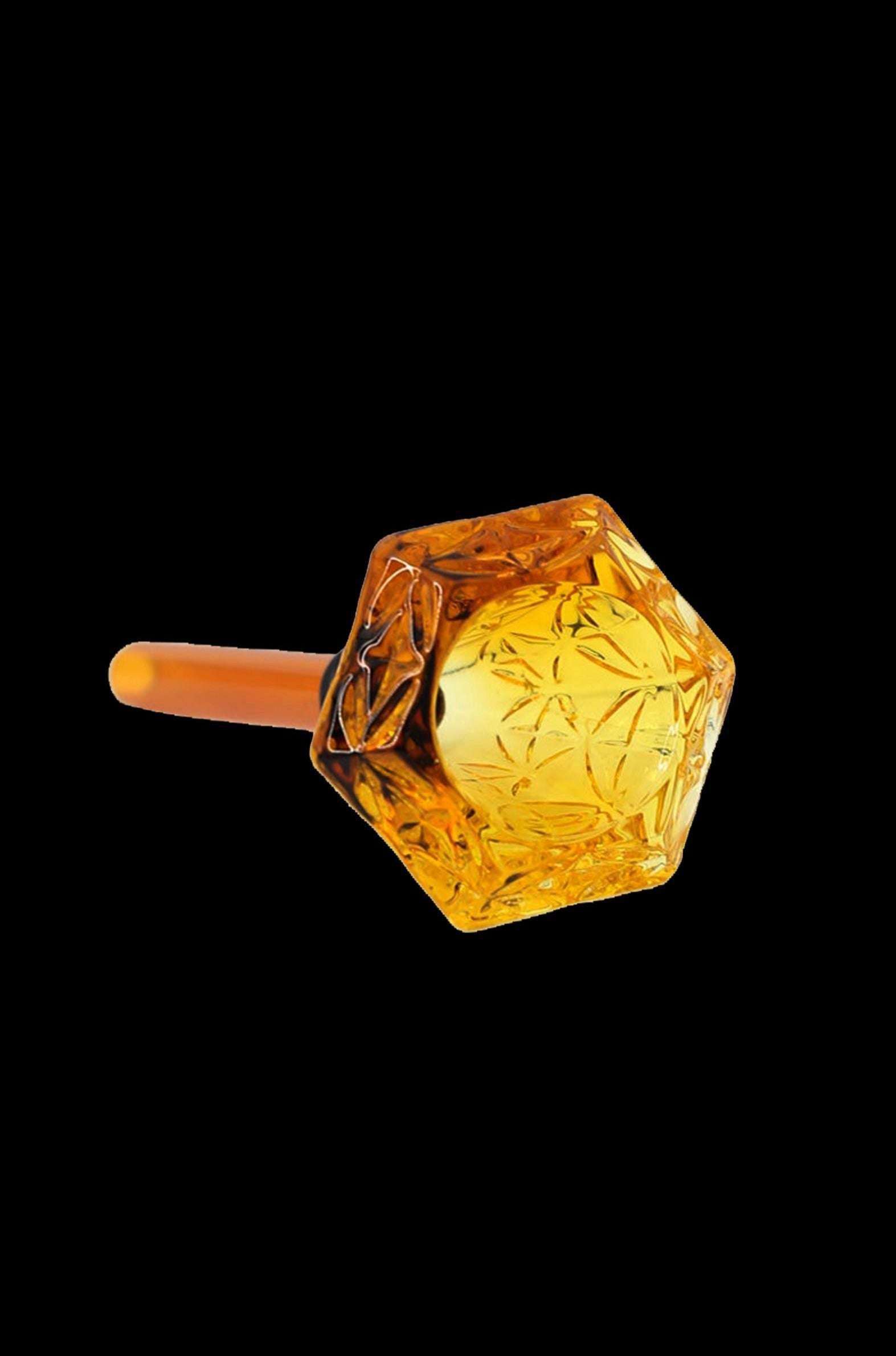 Amber glass oil dome with intricate starburst pattern and angled mouthpiece.