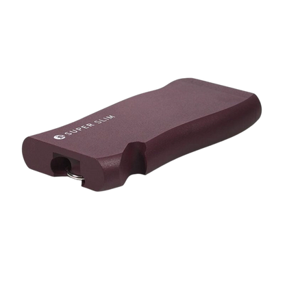 Angled close-up of the burgundy RYOT Super Slim Magnetic Dugout With One Hitter showing its slim curved body, corner opening, and small metal loop.
