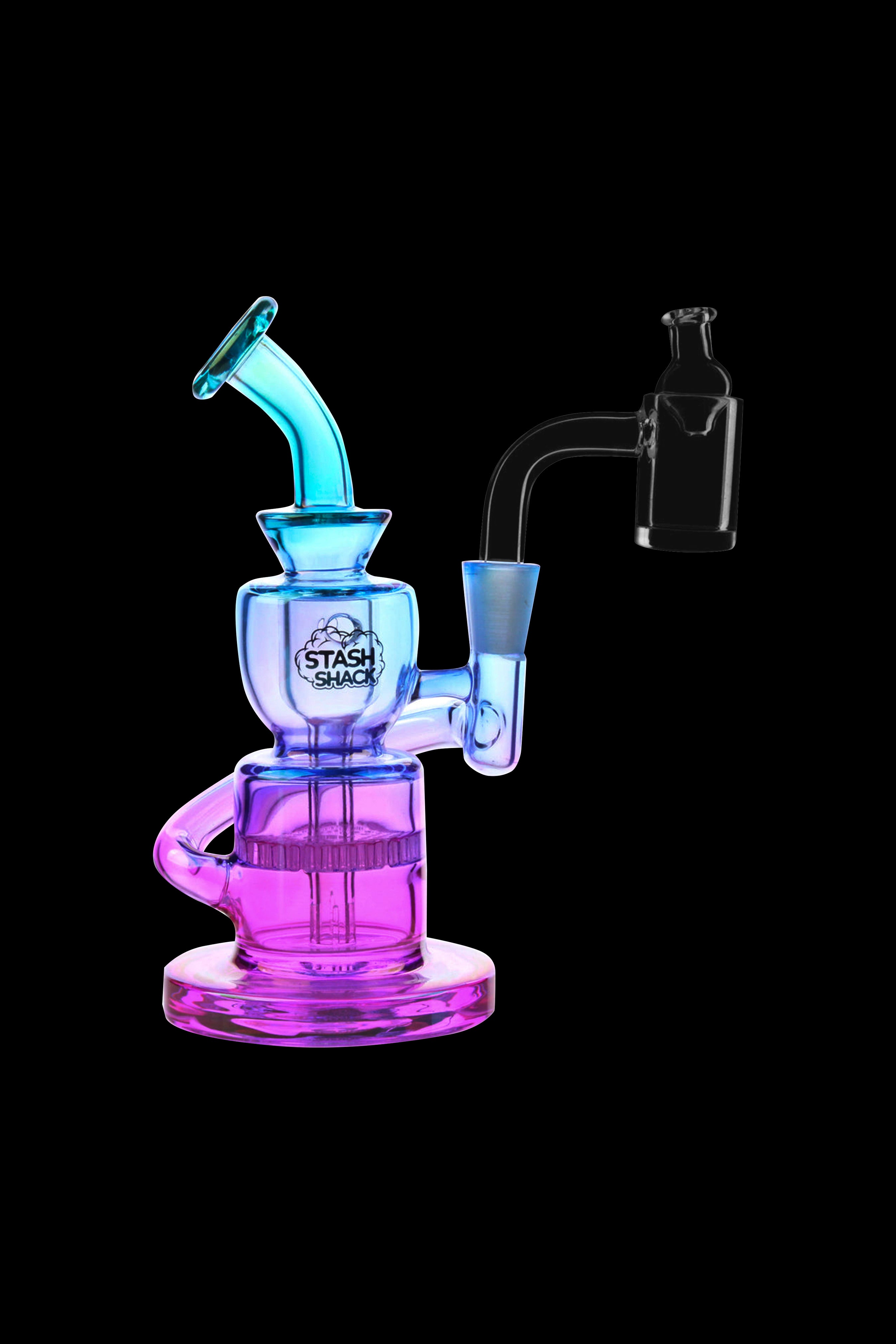 A colorful glass rig with a bubbler and quartz nail, branded "Stash Shack."
