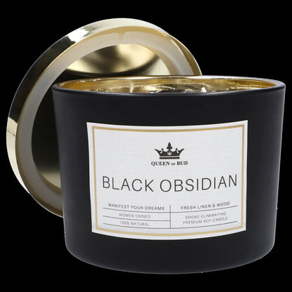 Black glass candle jar with gold lid, labeled "Queen of Bud - Black Obsidian - Smoke Eliminating Premium Soy Candle."