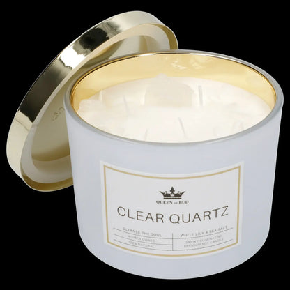 White candle jar with gold lid labeled "Clear Quartz" and branding for "Queen of Bud," promoting a "cleanse the soul" aromatherapy experience.