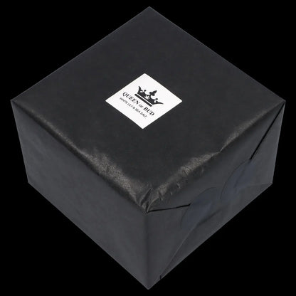 Black gift box with “Queen of Bud - White Lily & Sea Salt” label.